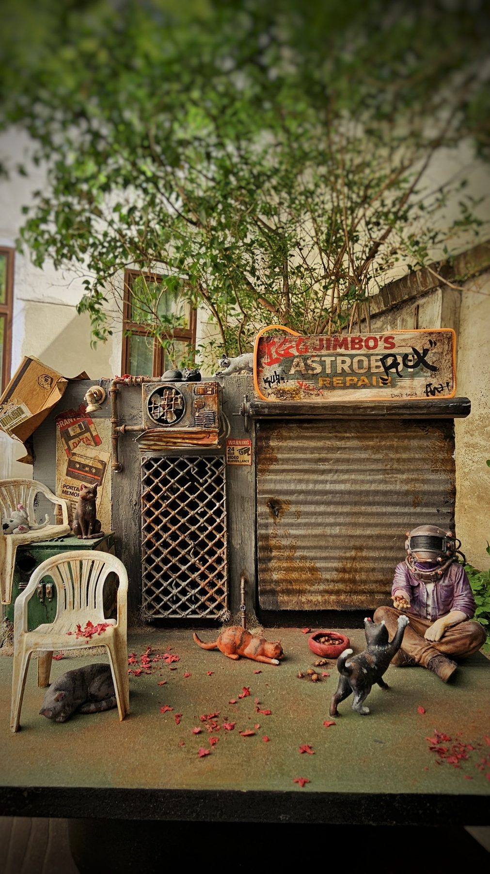 Full Lunch Time diorama scene with cats, repair shop and overgrown courtyard