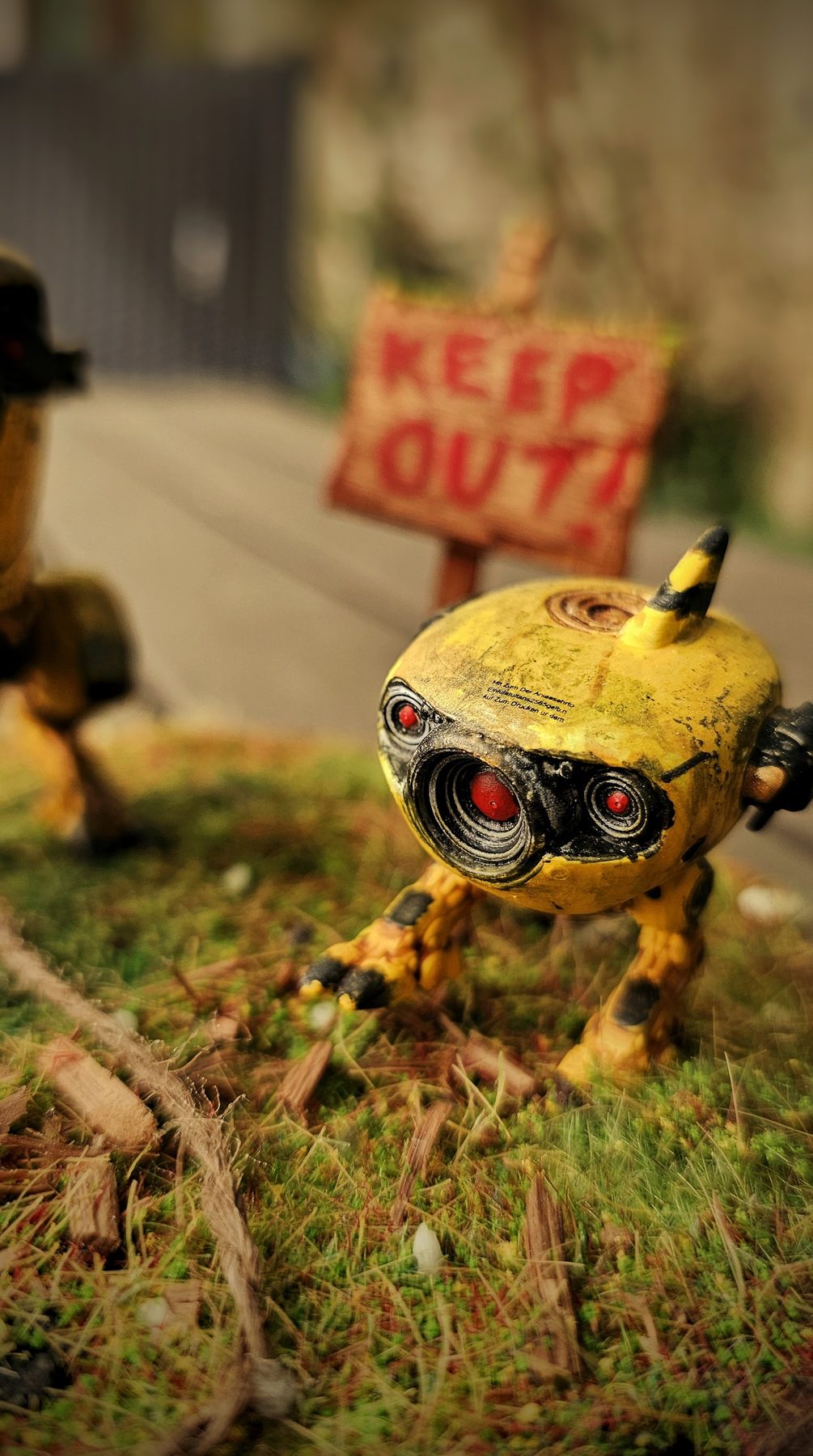 RoboChick robotic chicken diorama with yellow machine body and keep out sign