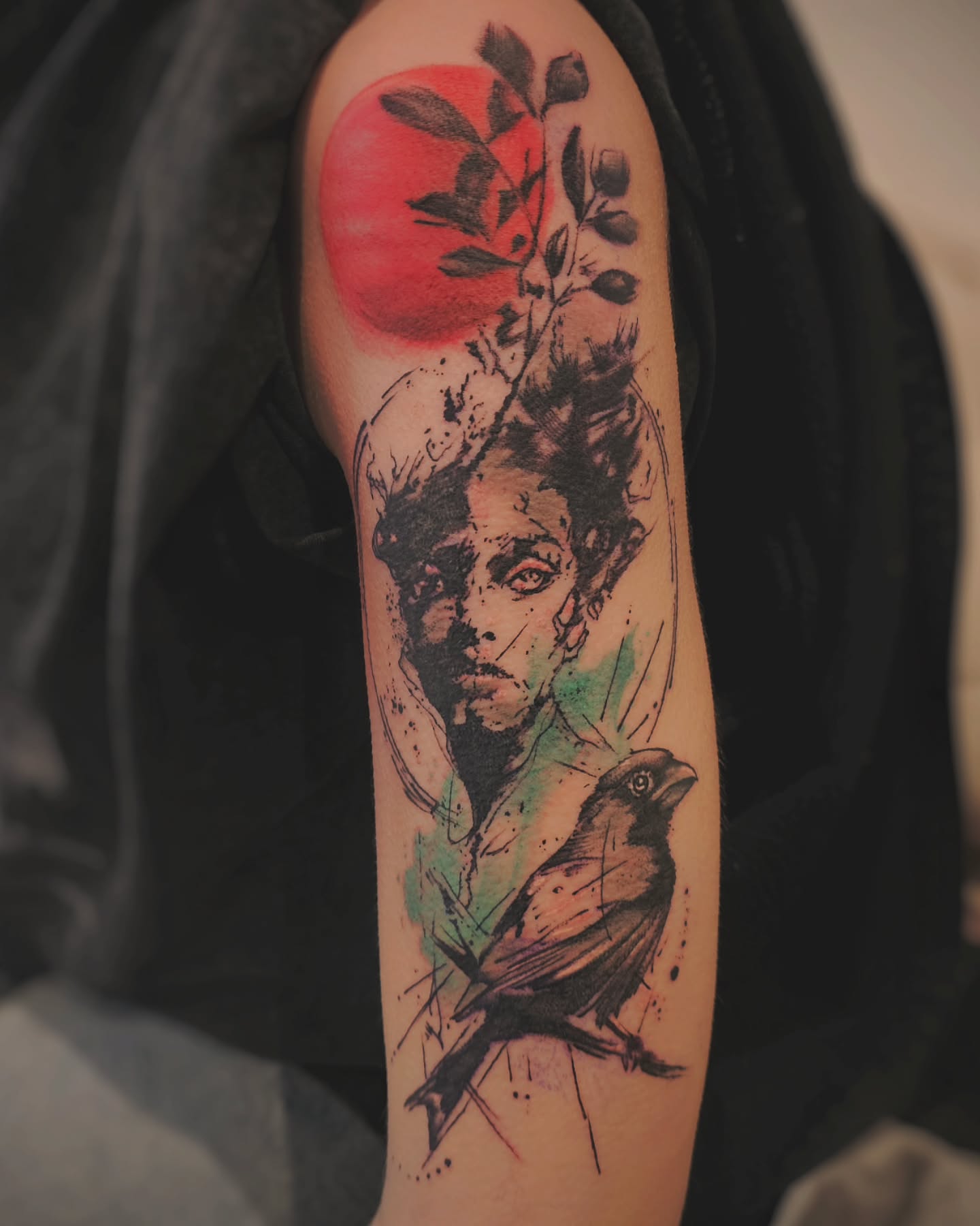 Humanism tattoo with face, bird and red sun