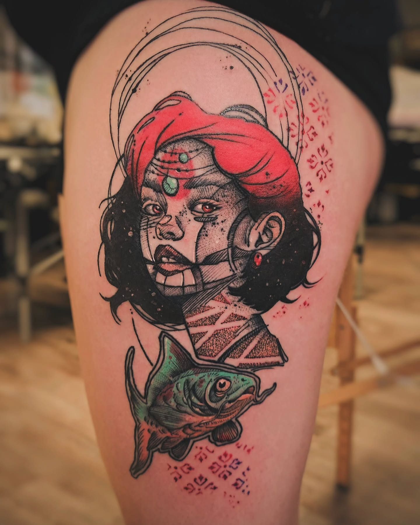 Humanism tattoo portrait with red hair and fish