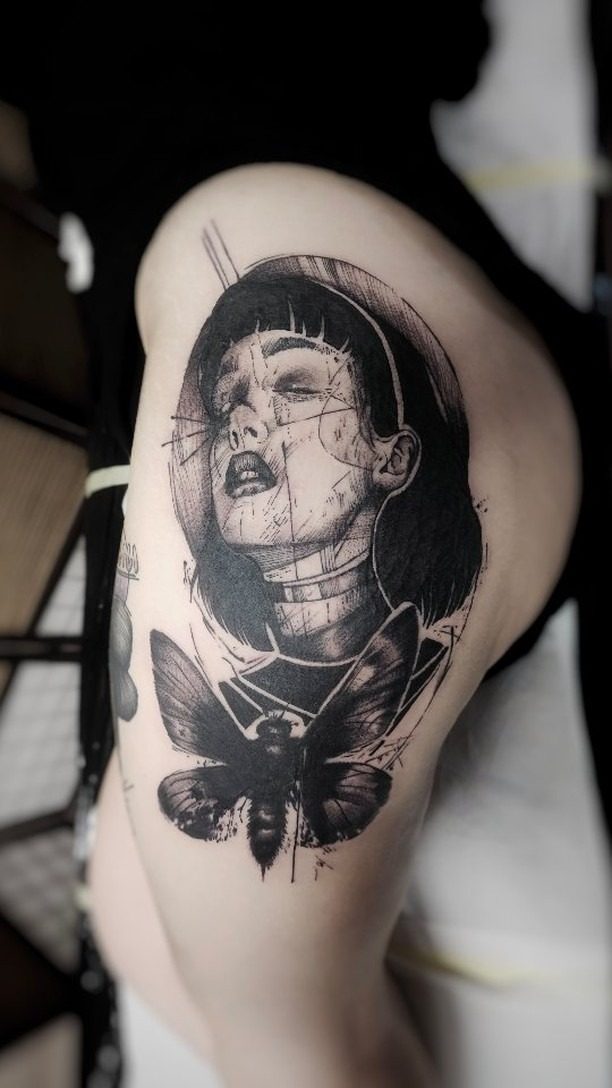 Humanism blackwork portrait tattoo with moth