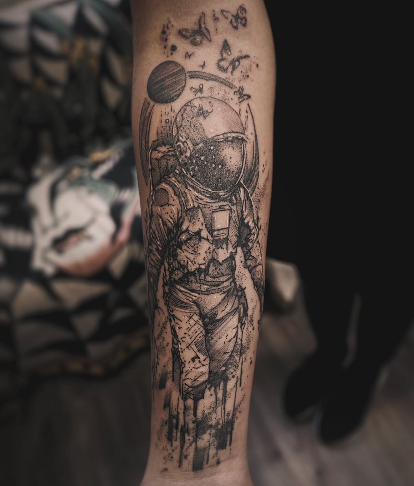 Humanism astronaut tattoo in blackwork style